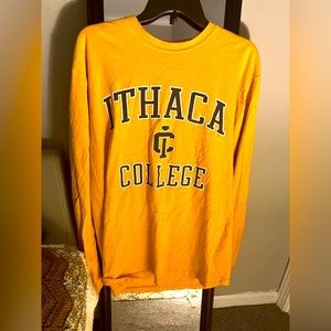 Neon yellow Ithaca College long sleeve. Has “IC” monogram on the back.